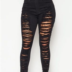 Shredded overly distressed fringe stretch jeans Size 31